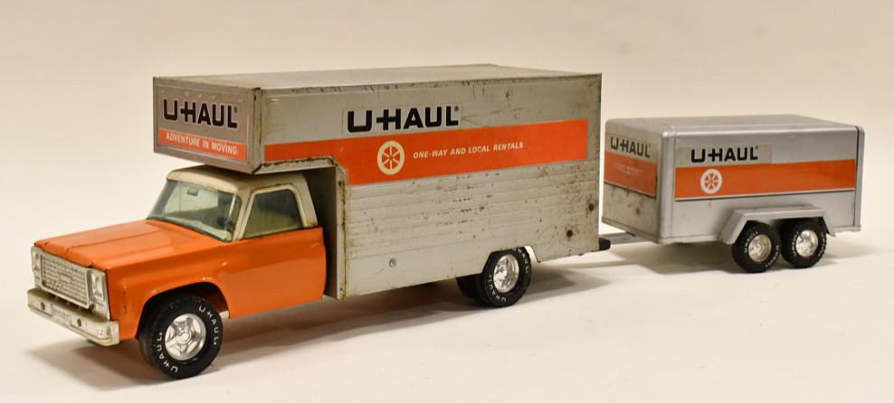 Nylint U-Haul Moving Box Truck w/ Enclosed Trailer: Nylint U-Haul moving box truck with enclosed trailer. Nice condition with wear from play and age. Overall measures approximately 26" long.