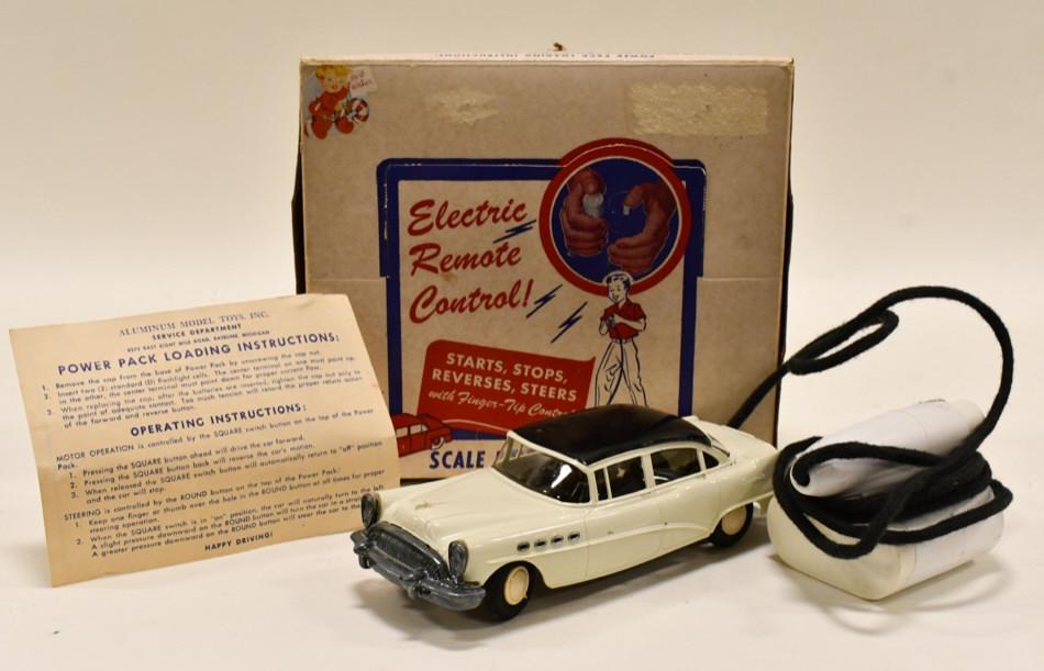 AMT Electric Remote Control Scale Model Automobile: AMT electric remote control scale model Buick automobile in the original box. Also comes with the original instructions. The car has some wear from play and age. Toy is untested. Car measures approxim