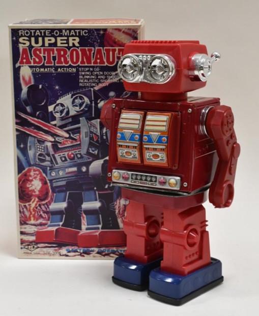 S.J.M. Battery Op. Rotate-O-Matic Super Astronaut: Taiwan S.J.M. tin and plastic battery operated Rotate-O-Matic Super Astronaut robot in the box. The battery compartment is clean, but the toy is untested. Both the box and toy are in nice condition wi
