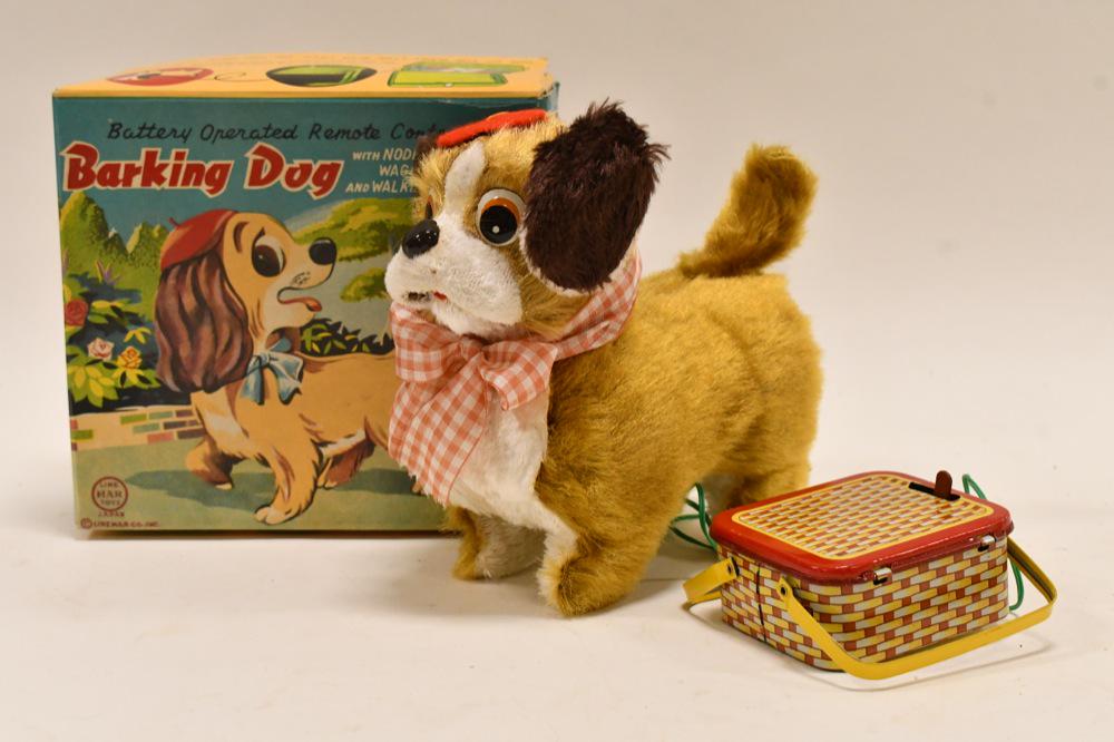 Linemar Toys Battery Op Remote Control Barking Dog: Linemar Toys battery operated remote control barking dog. Displays nicely in the box. Toy has some light wear from play and age. The remote control is shaped like a picnic basket. Toy is untested. Mea