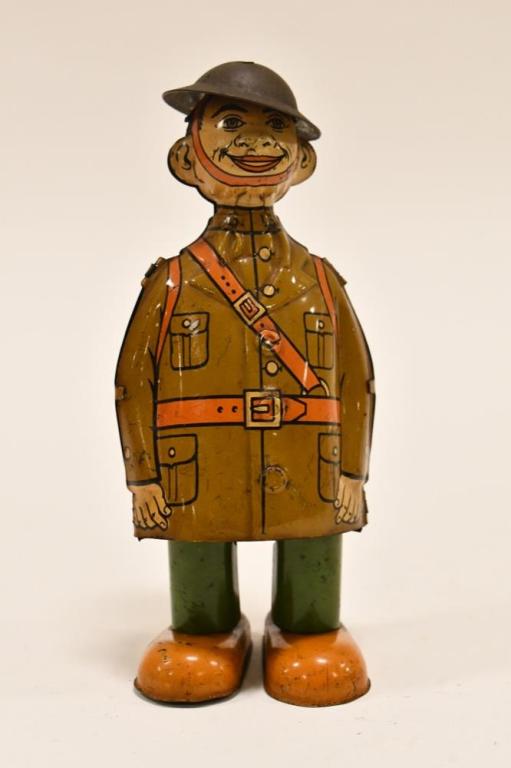 J. Chein Tin Litho Windup Doughboy Soldier Walker: J. Chein tin litho windup Walking WW1 Doughboy Soldier. The walker is in nice condition with some paint loss and wear from play and age. The windup works. Measures approximately 6" tall.