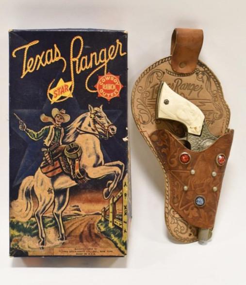 Leslie-Henry Texas Ranger Cap Gun w Holster In Box: The set includes a single leather holster (missing the belt) and a Leslie-Henry "Ranger" cap gun pistol. The box has some wear from storage and age. The gun has corrosion, and the grips are loose. The