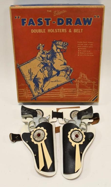 Stevens Pioneer Cap Gun Set w/ Leather Holster: Stevens Pioneer cap gun set with leather holster. Comes with the Kilgore fast-draw holster box. The triggers work on the guns. Displays nicely with some corrosion and wear from age. One of the ribbons