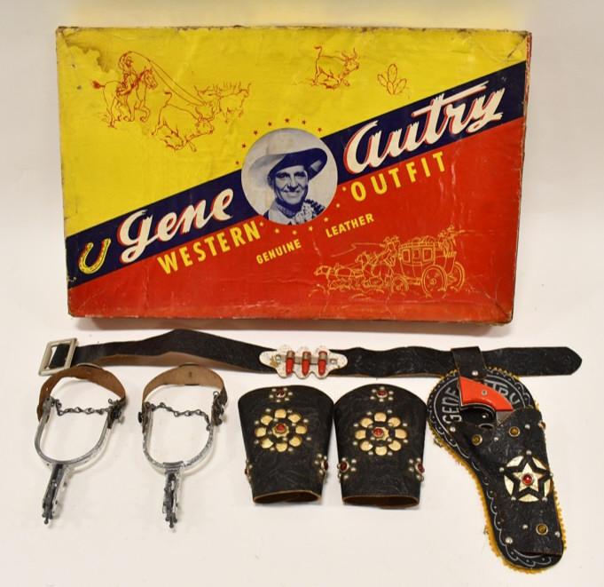 Kenton Gene Autry Cap Gun Outfit Set: Kenton Gene Autry cast iron cap gun with holster, cuff links, and spurs. The set displays well with some corrosion and wear from use and age. The trigger works on the gun, but someties sticks. Gun mea