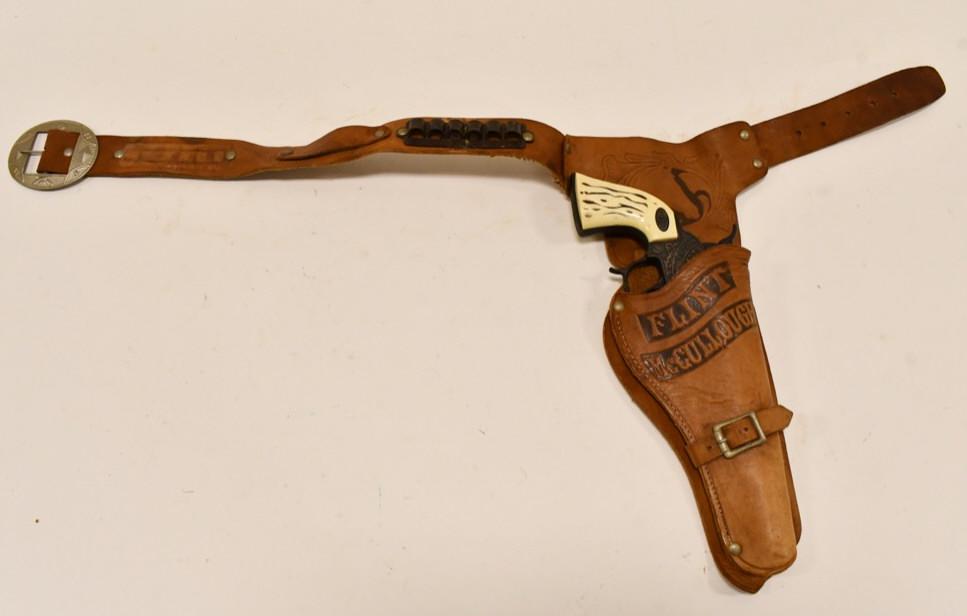 Halco Wagon Train Cap Gun Flint McCullough Holster: Halco Wagon Train 44 cap gun pistol with Flint McCullough leather holster. The trigger works, and the cylinder revolves most of the time. When the trigger is pulled the gun makes a springing noise. Th