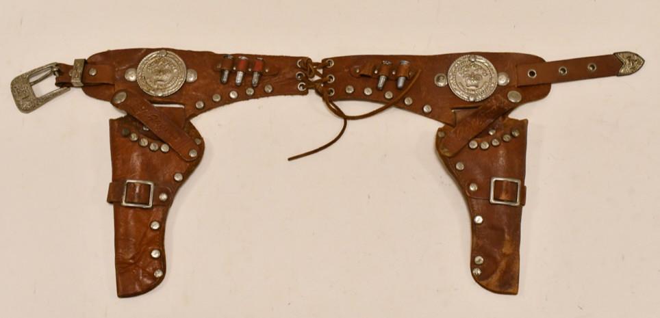 Roy Rogers King of the Cowboys Cap Gun Holster: Roy Rogers "King of the Cowboys" leather cap gun holster by the Rau Fastener Co. Displays nicely with fancy Roy Rogers buttons. Measures approximately 9" long.