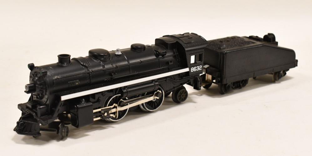 Lionel 8632 Locomotive With Tender: Lionel O-Gauge 8633 locomotive with tender. Both have wear from use and age.