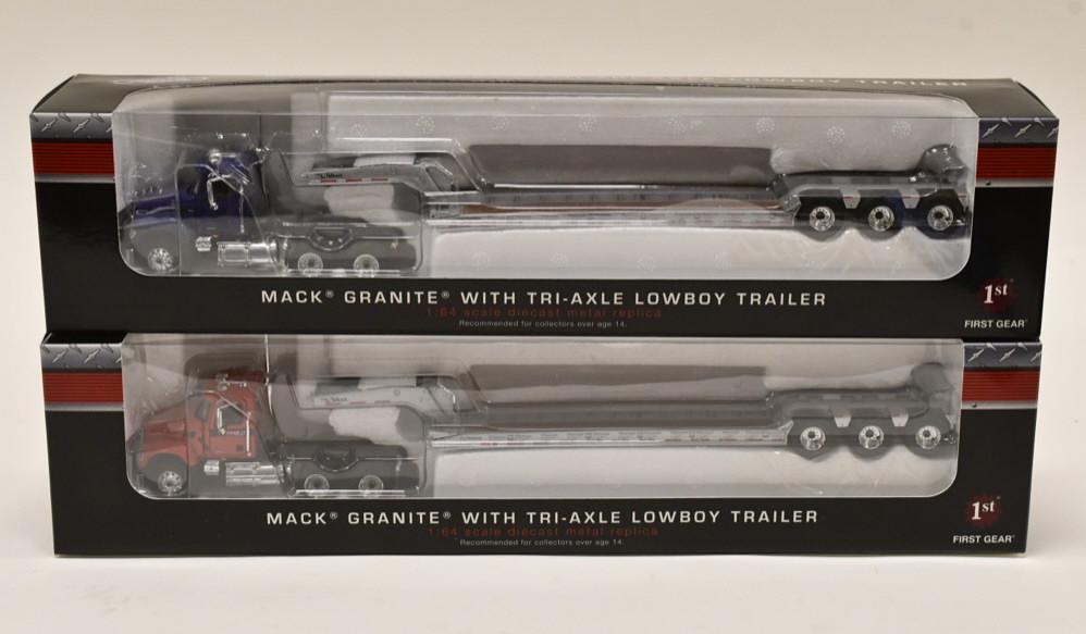 (2) 1/64 1st Gear Mack Granite w/ Tri-Axle Lowboys: (2) 1/64 scale 1st Gear Mack Granite trucks with tri-axle lowboy trailers. One is blue and the other is Case IH red. Nice condition in the boxes with the shipping boxes.