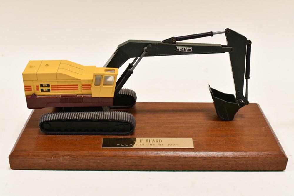 1/50 Bucyrus Erie Excavator PLCA President 1974: 1/50 scale Bucyrus Erie excavator Pipe Line Contractors Association President 1974 J.E. Beard. Displays nicely on wood base.