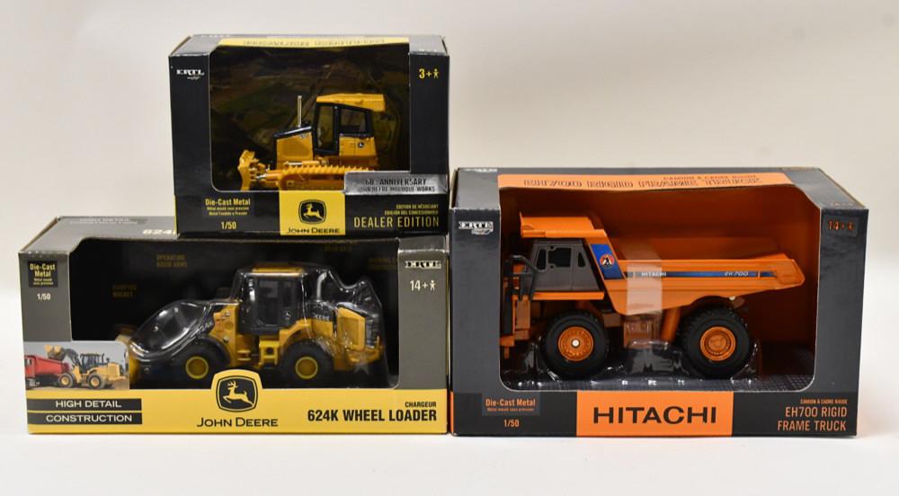 1/50 Ertl JD Wheel Loader, Crawler, & Dump Truck: 1/50 scale Ertl John Deere 624K wheel loader, John Deere 650J crawler, and Hitachi EH700 rigid frame dump truck. The boxes have wear from storage and display.
