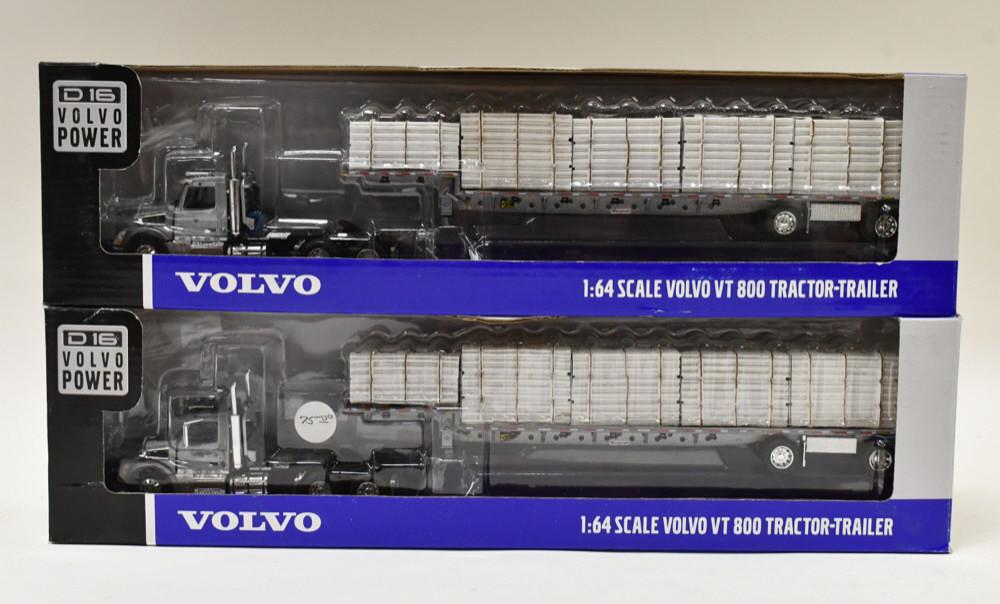 (2) 1/64 DCP Volvo VT800 Tractor w Loaded Stepdeck: (2) 1/64 DCP Volvo VT800 semi with pipe loaded stepdeck trailer. Nice condition in the boxes. Item no. 31748