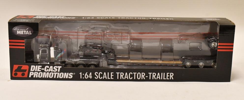 1/64 DCP Peterbilt 389 w/ Fontaine Lowboy Trailer: 1/64 DCP Peterbilt 389 tri-axle day cab with fontaine lowboy trailer with flip axle. Nice condition in the box. Item no. 33340