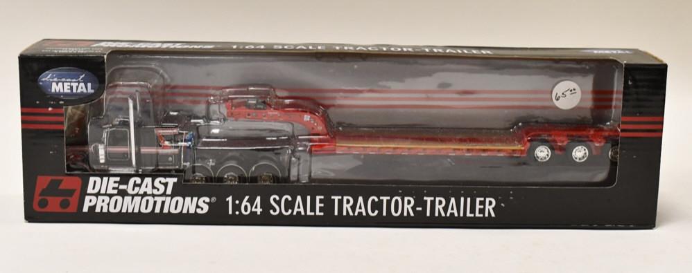 1/64 DCP Kenworth W900L w/ Lowboy Trailer: 1/64 DCP Kenworth W900 L with lowboy trailer. Nice condition in the box. Item no. 32524.