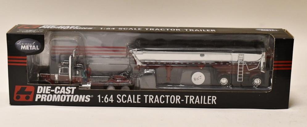 1/64 DCP Peterbilt 379 w/ MAC Dump Trailer: 1/64 DCP Peterbilt 379 with MAC dump trailer. Nice condition in the box. Item no. 32849