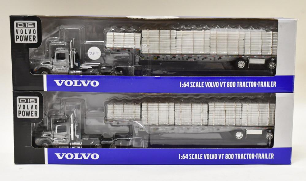 (2) 1/64 DCP Volvo VT800 Tractor w Loaded Stepdeck: (2) 1/64 DCP Volvo VT800 semi with pipe loaded stepdeck trailer. Nice condition in the boxes. Item no. 31748