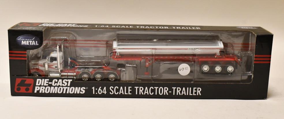 1/64 DCP Kenworth W900 w Side Dump Trailer: 1/64 DCP Kenworth W900 with SmithCo. side dump trailer. Nice condition in the box. Item no. 32350