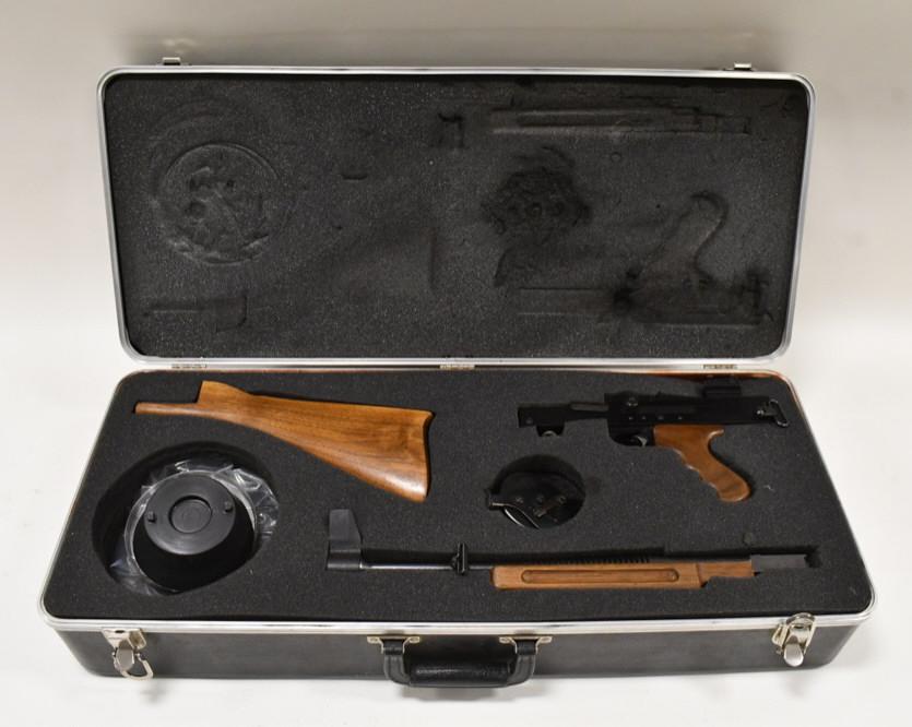 Feather Ind. American 180 .22 LR Semi-Auto Rifle: Feather Industries American 180 semi-automatic takedown rifle in 22 LR. The rifle is in nice used condition and has a 17.5" barrel, drum mag, instructions, pistol grip, and custom hard case. SN: SAR10