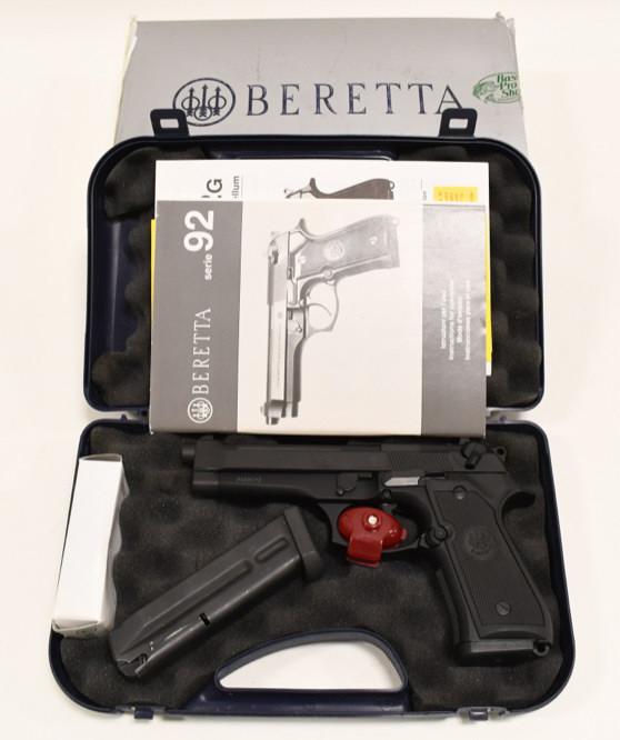 Beretta Model 92FS 9mm Semi-Auto Pistol In Case: Italian Beretta Model 92FS semi-automatic pistol in 9mm. The black finish pistol is in great near new condition in the original hard plastic case with two magazines, instructions, and gun lock. Has a 