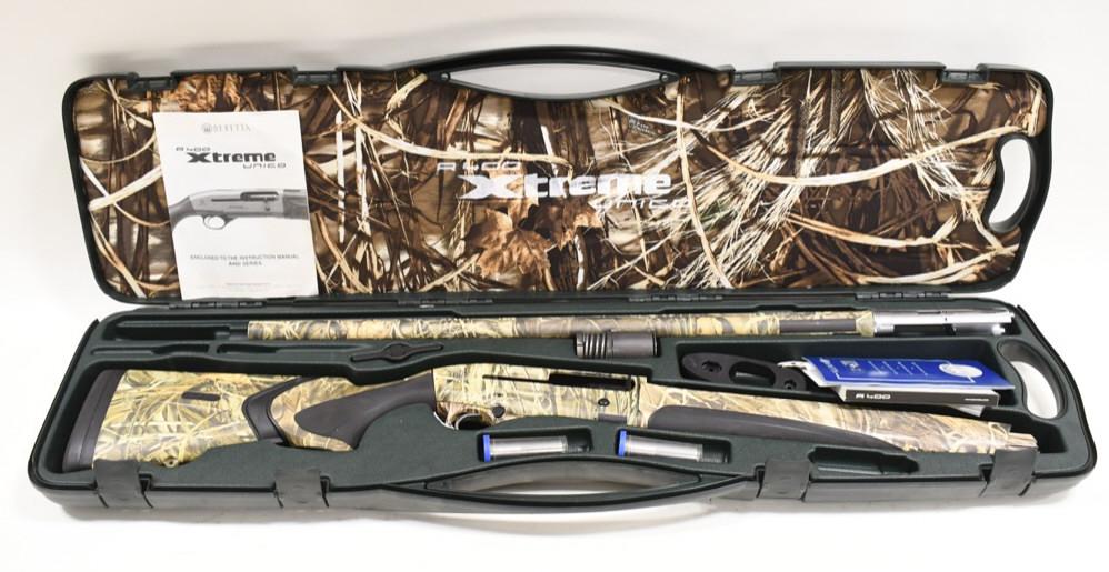 Beretta A400 Extreme 12 Ga. Semi-Automatic Shotgun: Beretta Model A400 Extreme semi-automatic shotgun in 12 gauge. The camo shotgun is in nice condition with some wear and has a 26" vented barrel. Comes with two chokes, instruction, and original hard c