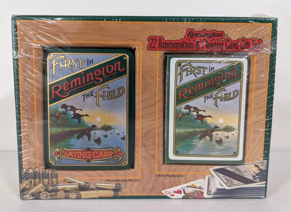 Remington .22LR Ammunition & Playing Card Gift Set: Sealed box of 200 rounds of Remington .22LR Golden Bullets cartridges and two decks of playing cards in collectible tins.