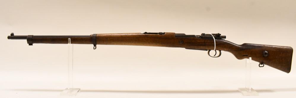 Turkish Ankara 1935 Mauser Bolt Action 8mm Rifle: Nice Turkish Ankara 1935 Mauser bolt action rifle in 8mm. The rifle has a 29" barrel and is in good used condition, non-matching serial numbers. SN:17251. FFL required for transfer. (213-4)