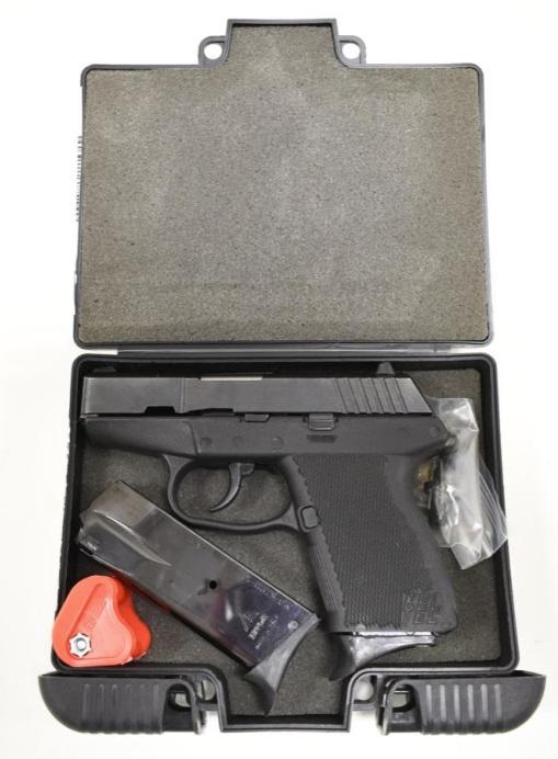Kel-Tec P-11 9mm Semi-Automatic Pistol In Case: Kel-Tec Model P-11 semi-automatic pistol in 9mm. The black finish pistol has a 3" barrel and is in near new condition with two magazines, instructions, trigger lock, and hard plastic case. SN:AHN16. F