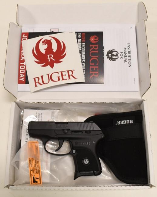 Ruger LCP .380 Auto Semi-Auto Pistol New In Box: Ruger Model LCP semi-automatic pistol in .380 Auto. The black finish pistol has a 2.75" barrel and is in new condition in the original box with lock, holster, and instructions. SN:372413275. FFL requi