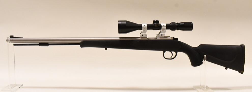 Traditions Lightning Bolt .54 Cal. Muzzleloader: Traditions Lightning Bolt Action black powder rifle in .54 caliber. The muzzleloader is in nice condition with some use wear and has a 24.5" barrrel and the ramrod. Comes with BSA scope. SN: 14-13-033