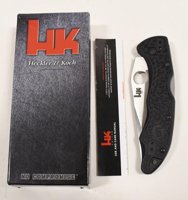 Heckler & Koch Benchmade Tactical Folding Knife: Heckler & Koch Benchmade tactical folding knife model no. 8Cr14MoV with box and paperwork. Nice condition with light wear. When closed it measures approximately 5" across.