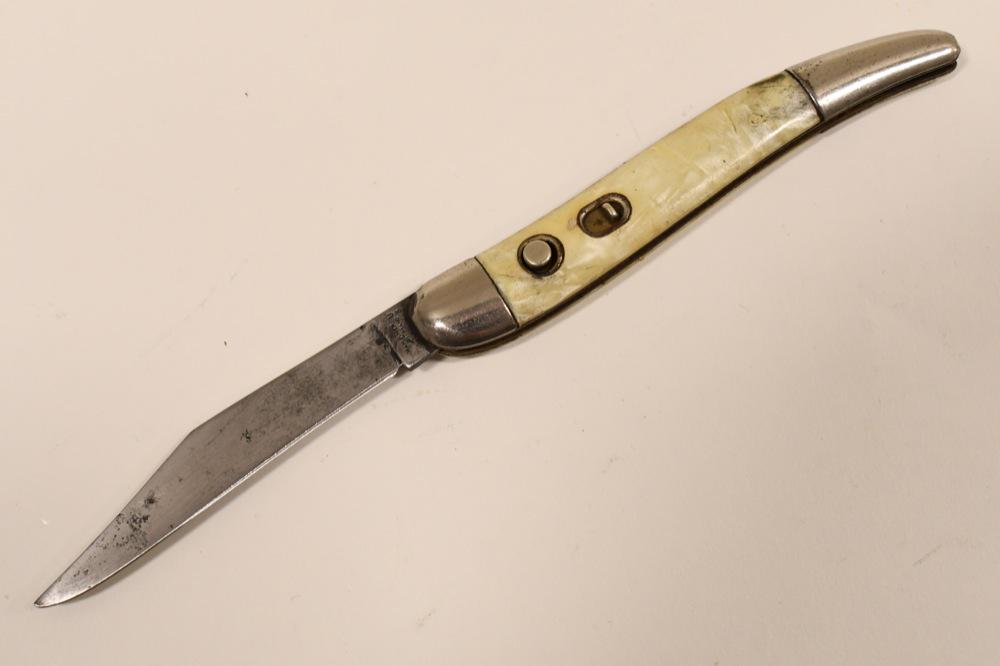 Vintage Hammer Brand Switchblade Folding Knife: Vintage Hammer Brand switchblade automatic folding knife. Fair condition with wear from use and age. Does have initials carved into and wear to perloid handle grips. Blade works well. When closed it m