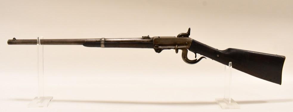 Civil War Breech Loading Burnside Carbine: Civil War black breech loading Burnside carbine in .54 Burnside. The carbine is in good antique used condition and has a 21" barrel, dated 1863 on barrel.