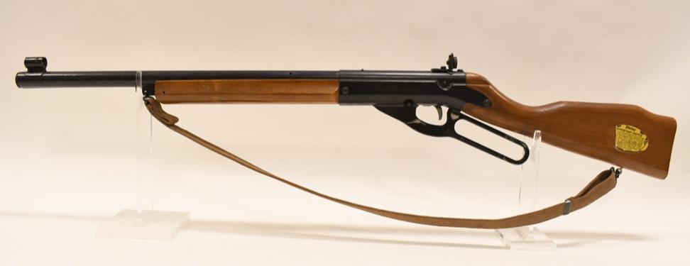 Daisy Model 99 Champion Lever Action BB Rifle: Daisy Model 99 Champion Lever Action BB Gun. Untested, wood stock, good condition with age & use wear. Comes with sling.