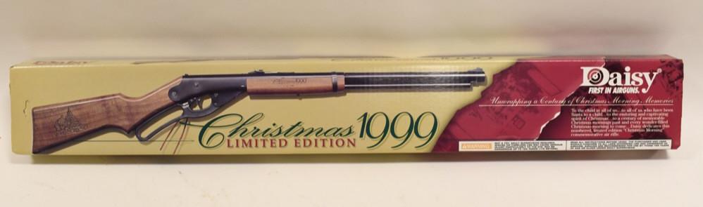 1999 Christmas Ltd Ed Daisy BB Gun NIB: 1999 Christmas Limited Edition Daisy Model 1938B Lever Action BB Gun. New in the original box with COA and shipper box. Number 863 of only 1500 produced.