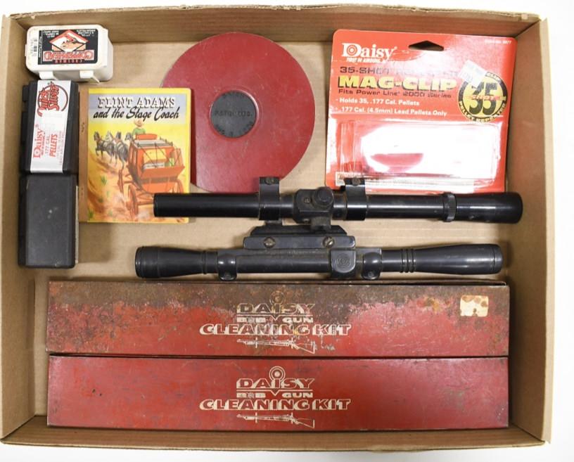 Tray Lot of Daisy BB Gun Accessories: Lot includes two scopes, two cleaning kits, pellets, and more.