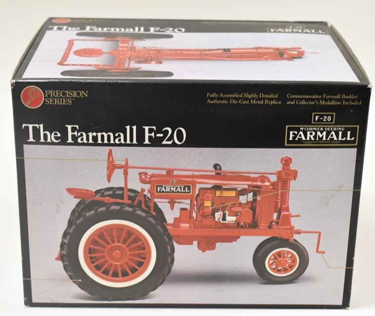 1/16 Ertl McCormick-Deering Farmall F-20 NF: 1/16 Ertl McCormick-Deering Farmall F-20 narrow front precision classics #4. Good condition in the box. Box has some wear and tear.