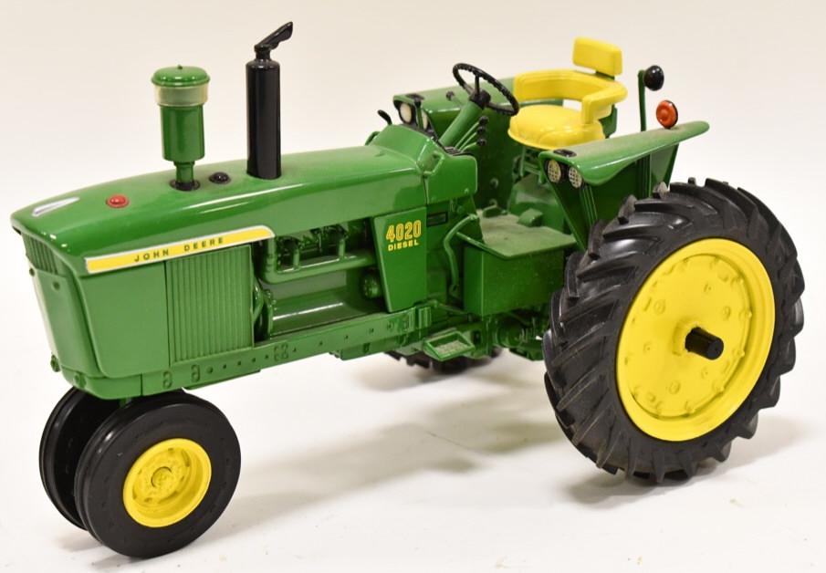 1/16 Ertl John Deere 4020 NF Diesel Precision: 1/16 scale Ertl John Deere 4020 narrow front diesel tractor precision classics series. Good condition with dust and wear from display. No box.