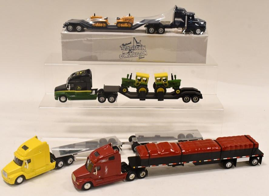 1/64 Custom Volvo Semi Trucks & Trailers: 1/64 scale Custom Semi with lowboy and John Deere crawler load, Volvo with John Deere 4020 load, Volvo with flatbed and pup, and Volvo with tarped load.