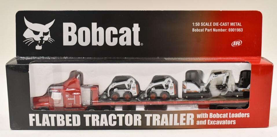 1/50 Bobcat Flatbed w/ Loaders & Excavators: 1/50 scale Bobcat flatbed tractor trailer with Bobcat loaders and excavators. Also includes (2) 1/25 scale Bobcat 325 compact excavators. Good condition in the box.