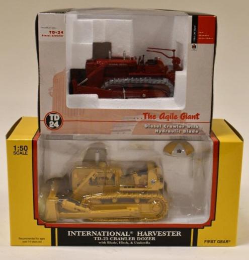 1/50 1st Gear International TD-25 & TD-25 Crawlers: 1/50 scale 1st Gear International diesel crawler with hydraulic blade, and International Harvester TD-25 crawler doer with lade, hitch, and umbrella. Good condition in the boxes.