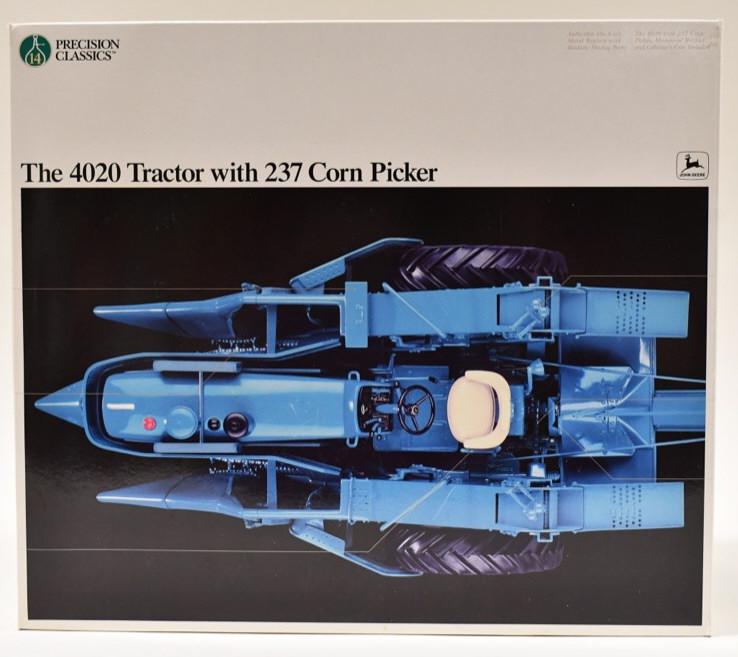 1/16 Ertl John Deere 4020 Tractor w/ 237 Picker: 1/16 scale Ertl John Deere 4020 tractor with 237 corn picker. Precision Classics series #14. Nice condition in the box. The box has some fading / discoloration.