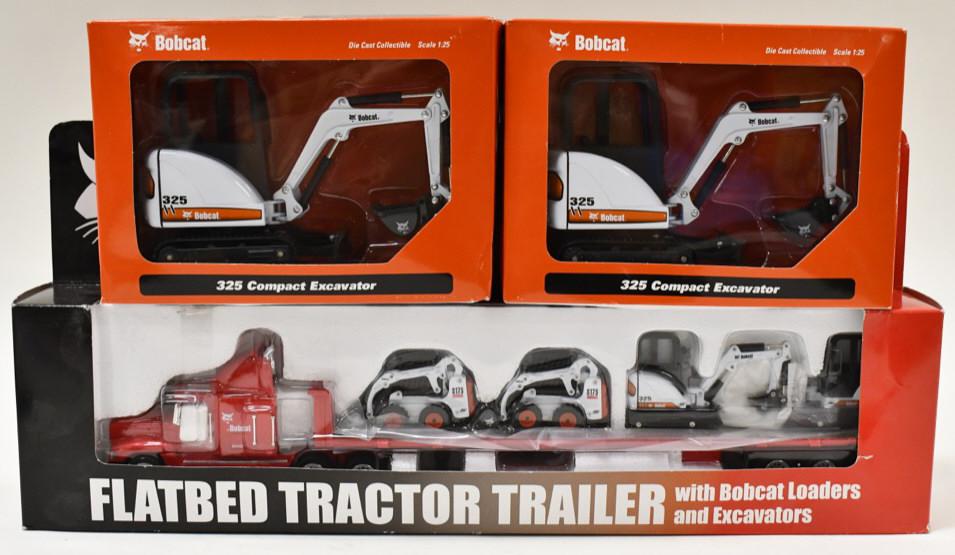 1/50 Bobcat Flatbed w/ Loaders & Excavators: 1/50 scale Bobcat flatbed tractor trailer with Bobcat loaders and excavators. Also includes (2) 1/25 scale Bobcat 325 compact excavators. Good condition in the box.
