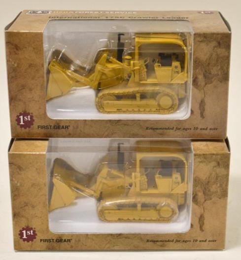 (2) 1/50 1st Gear International 175 Crawler Loader: (2) 1/50 scale 1st Gear International 175C crawler loader USDA Forest Service. Good condition in the boxes.
