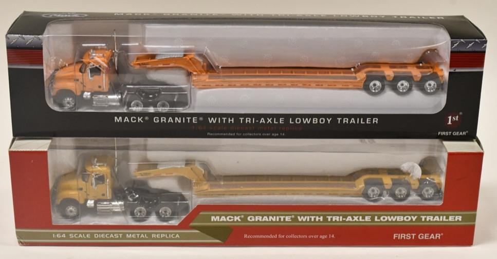 (2) 1/64 1st Gear Mack Granite Trucks w/ Lowboys: (2) 1/64 scale 1st Gear Mack Granite trucks with tri-axle lowboy trailers. Good condition in the boxes.