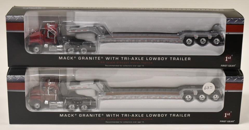 (2) 1/64 1st Gear Mack Granite Trucks w Lowboys: (2) 1/64 scale 1st Gear Mack Granite trucks with tri-axle lowboy trailers. Good condition in the boxes.