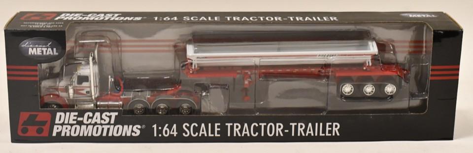 1/64 DCP Kenworth W900 w Side Dump Trailer: 1/64 DCP Kenworth W900 with SmithCo. side dump trailer. Good condition in the box. Item no. 32350.