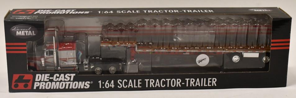 1/64 DCP Peterbilt 379 w/ Stepdeck Trailer: 1/64 DCP Peterbilt 379 63" flattop / day cab option with transcraft stepdeck trailer. Good condition in the box. Item no. 33393.