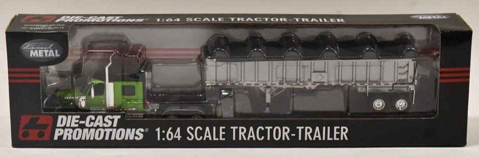 1/64 DCP International Lonestar w East End Dump: 1/64 DCP International Lonestar with East End dump trailer. Good condition in the box. Item no. 32751.