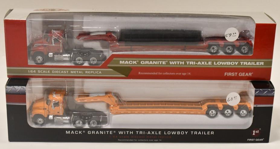 (2) 1/64 1st Gear Mack Granite Trucks w Lowboys: (2) 1/64 scale 1st Gear Mack Granite trucks with tri-axle lowboy trailers. Good condition in the boxes.