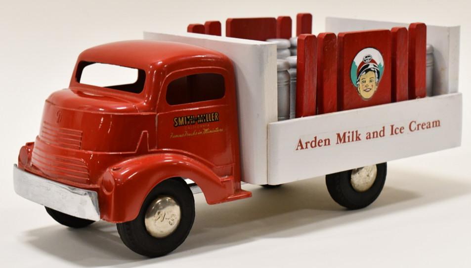 Restored Smith Miller Arden Milk Delivery Truck: Restored Smith Miller Arden Milk and Ice Cream delivery truck. Displays well with the milk cans. Good condition with some small paint knicks and wear from storage and display. Measures approximately 1