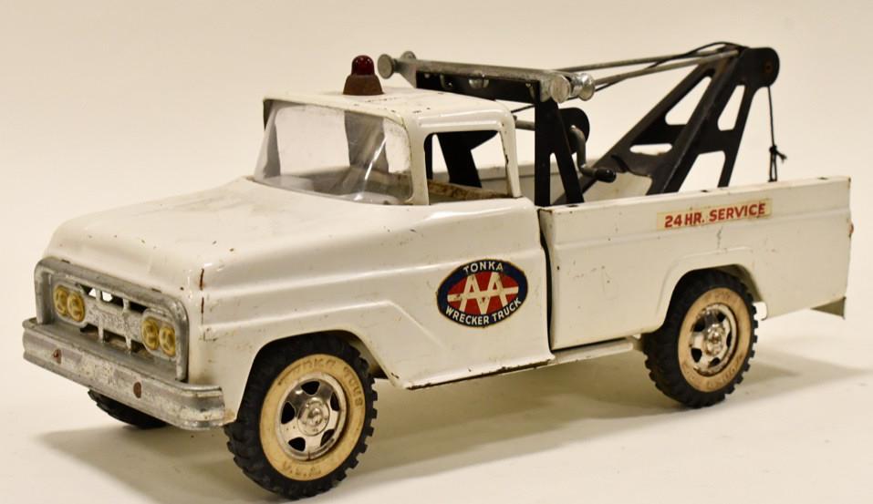 Original Tonka 24 Hour Service AA Wrecker Truck: Original Tonka 24 hour service AA square fender wrecker truck. Displays nicely with paint loss and wear from play and age. It is missing the winch hook. Measures approximately 14" long.